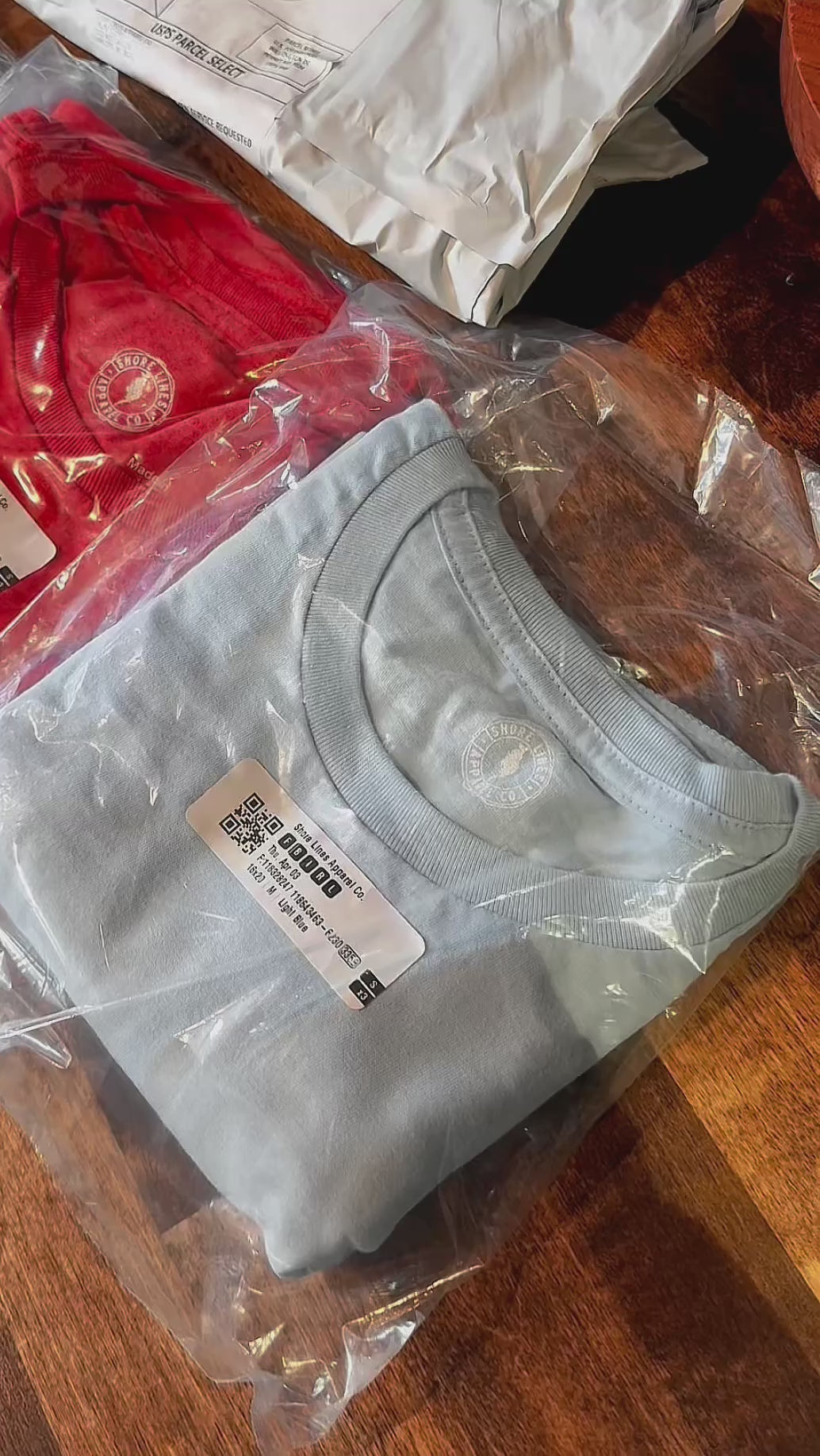 Load video: Shirts are packed up and ready to ship!